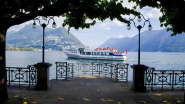 sailing-ship-against-misty-mountains-lugano-switzerland